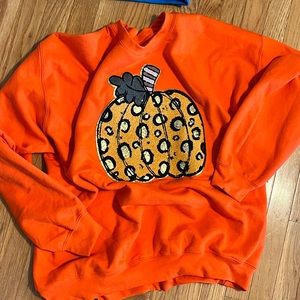 Brand NEW w/o tags , NEVER WORN.  pumpkin